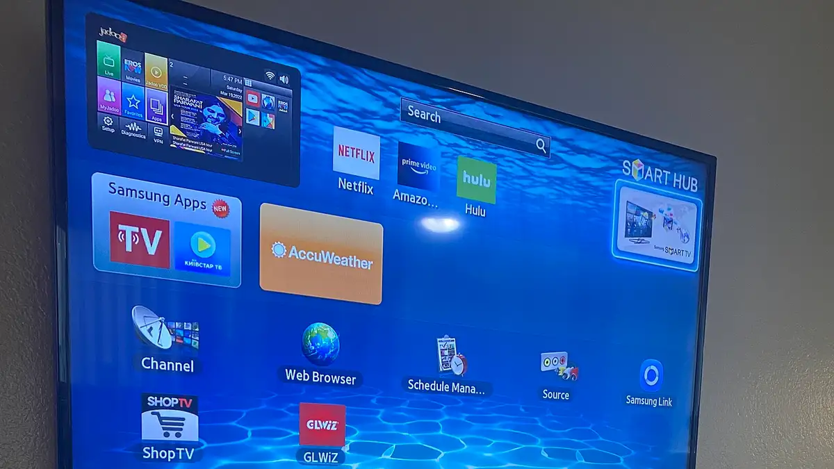 An E Series Samsung Smart TV from 2012. It runs Orsay, a distribution of Linux. Shown here is the home screen.